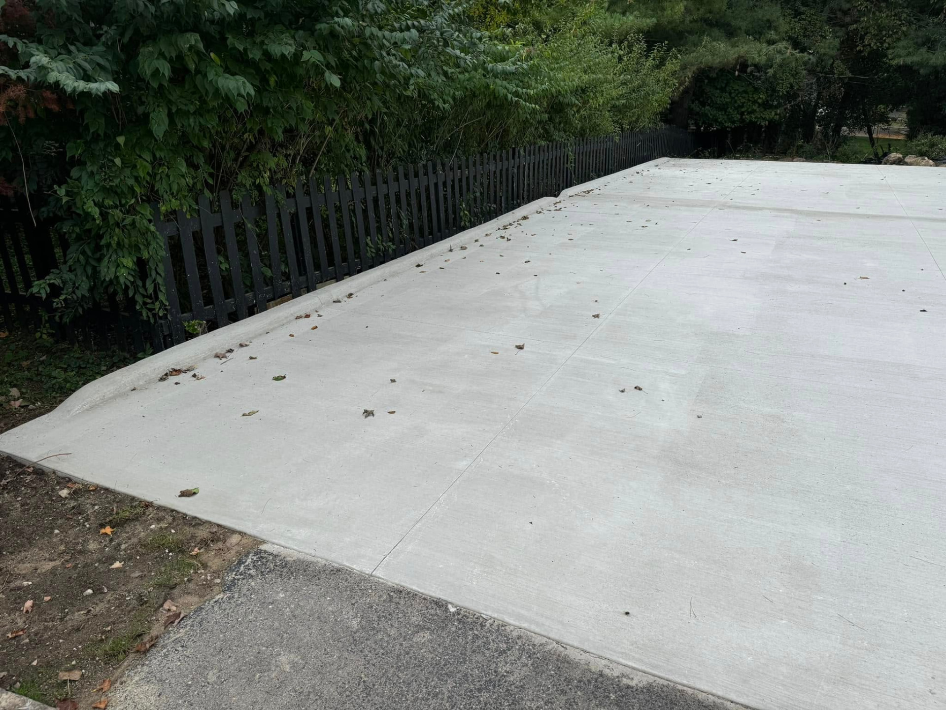 Large broom-finish concrete outbuilding pad by Marcucci Concrete Construction in Oakland County, Michigan
