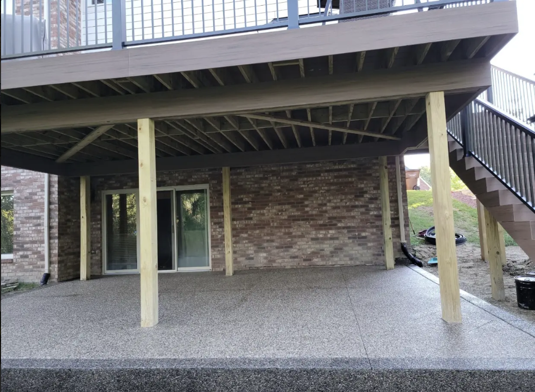 Covered exposed aggregate concrete patio by Marcucci Concrete in Oakland County, Michigan