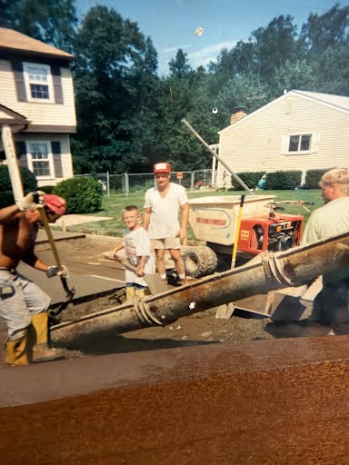 Archive photo of a Marcucci Construction residential driveway pour using a truck chute