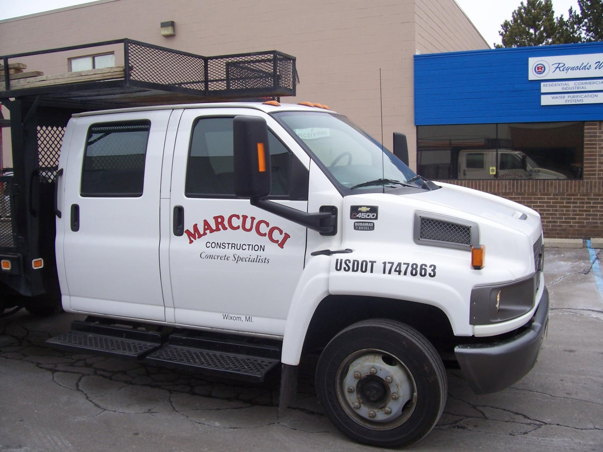 Company-owned Marcucci Construction Concrete Specialists crew truck, USDOT 1747863, based in Wixom, Michigan