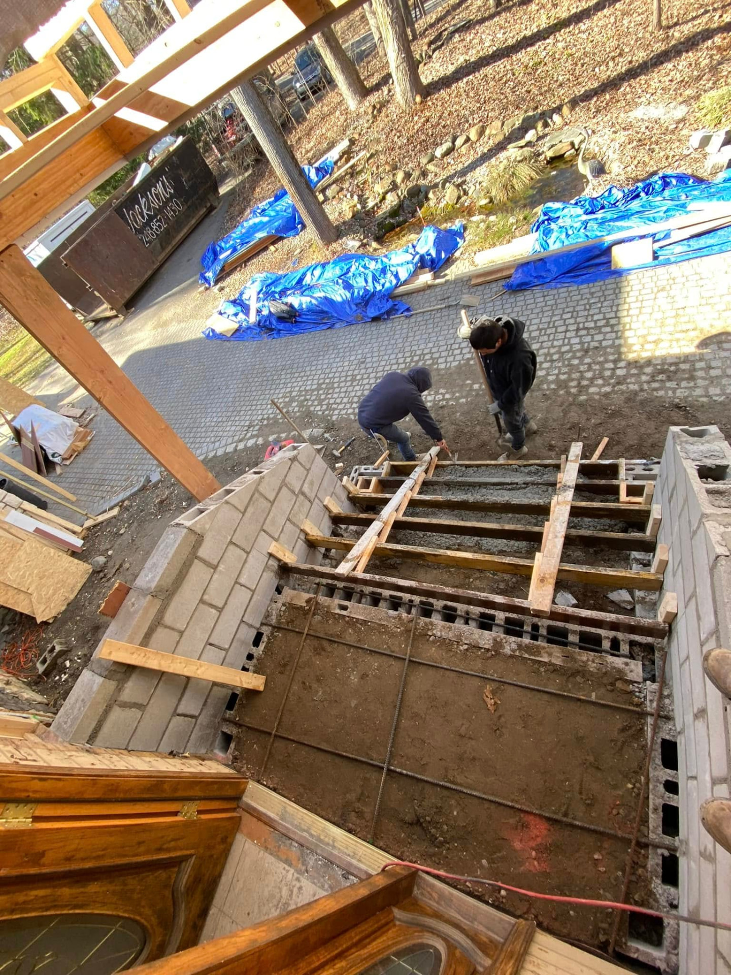 Reinforced concrete footing and block porch walls prepared by Marcucci Concrete Construction in Oakland County, Michigan