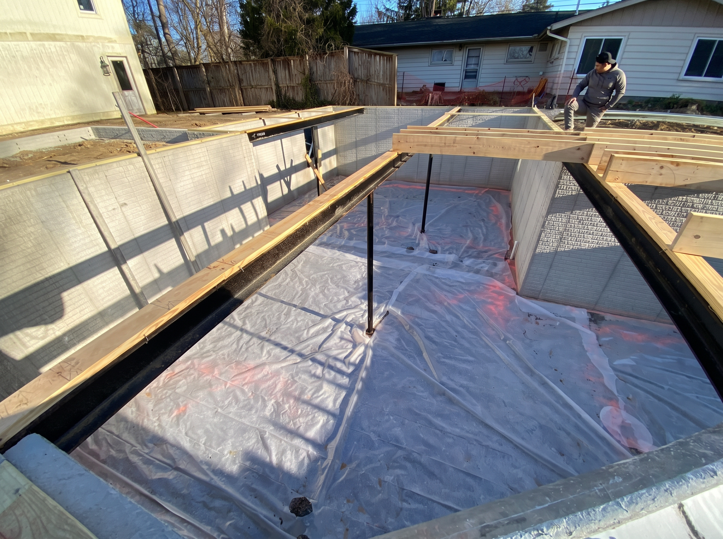 New residential basement foundation with reinforced walls and structural steel by Marcucci Concrete Construction in Oakland County, Michigan